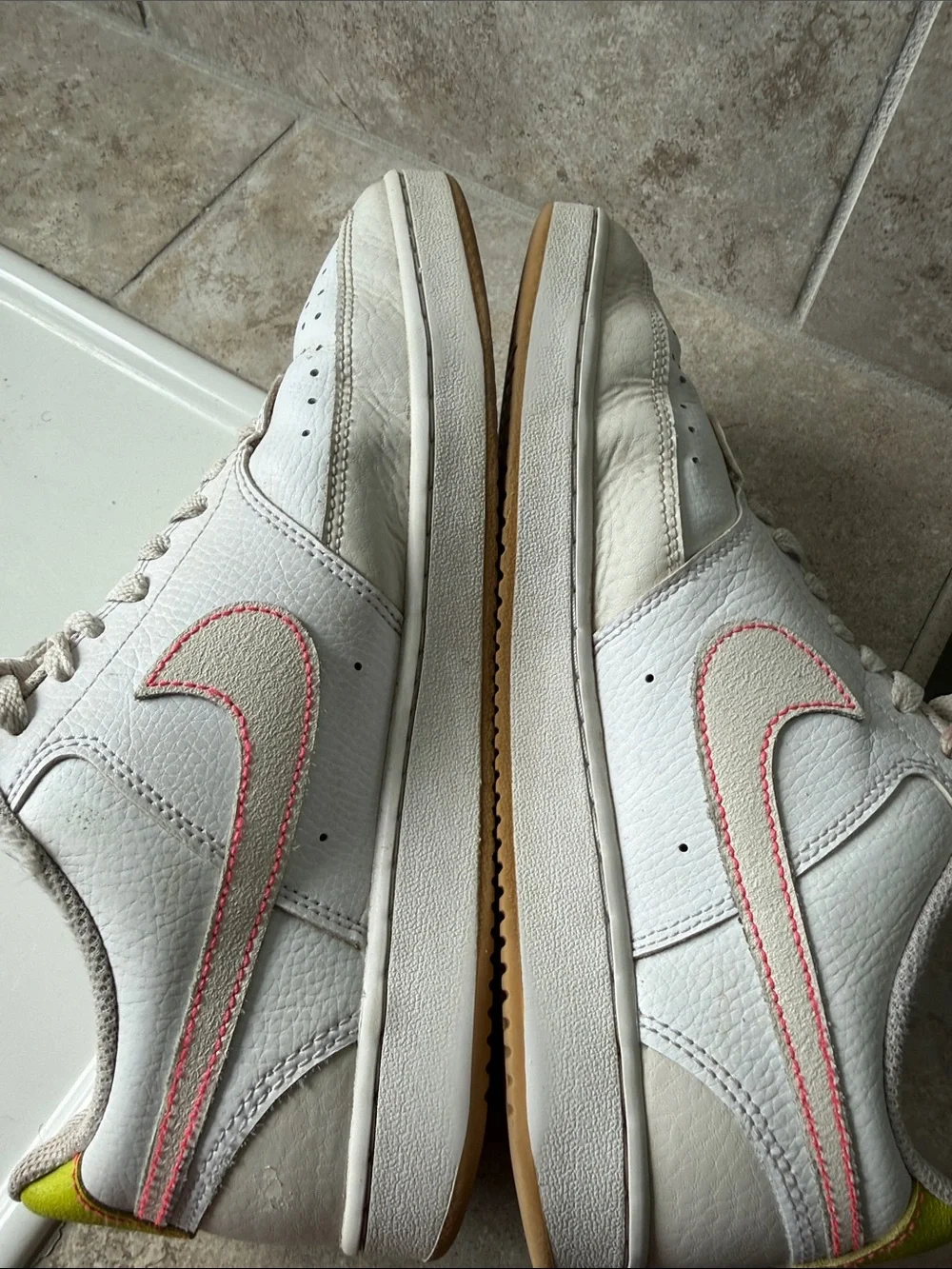 Nike White Leather Low-Top Sneakers with Pink Swoosh